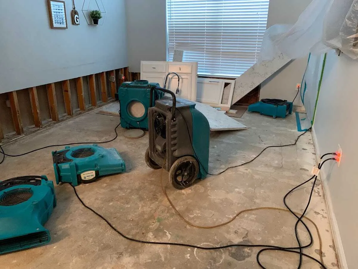 Dehumidifier in flood-cut room for Water Damage Restoration in Sunset Hills